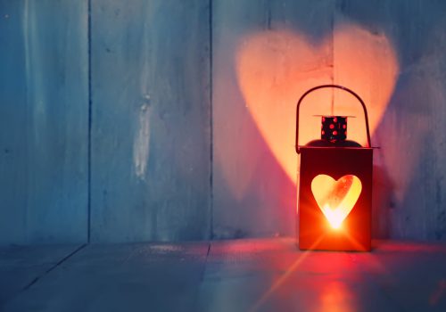 St Valentine's day greeting card with candle and hearts